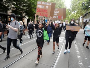 Protesters rally against the death in Minneapolis police custody of George Floyd, in Portland, Oregon, U.S. May 31, 2020. (REUTERS/Terray Sylvester)