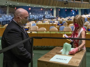 Norway's ambassador to the United Nations, Mona Juul, casts a vote during U.N. elections, Wednesday, June 17, 2020, at U.N. headquarters in New York. Norway and Ireland won contested seats on the powerful U.N. Security Council Wednesday in a series of U.N. elections held under dramatically different voting procedures because of the COVID-19 pandemic.