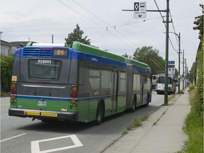 TransLink bus travelling in a priority lane westbound on 41st Avenue in Vancouver.