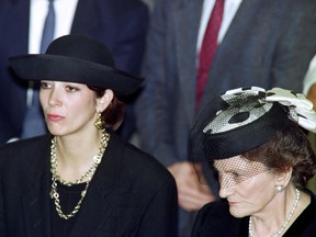 Robert Maxwell's daughter Ghislaine and wife Elisabeth attend the funeral service for burial on the Mount of Olives of their father and husband