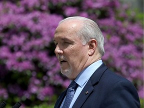 Premier John Horgan, speaking about forestry companies cutting back staff and operations in this province said Thursday "if they're wanting to access public timber in B.C., they need to ensure that they're meeting the requirements of participation in our economy here.”