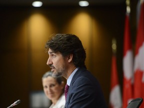Prime Minister Justin Trudeau and Deputy Prime Minister Chrystia Freeland at Thursday’s news conference in Ottawa announcing the $19-billion ‘Safe Restart Agreement’ with the provinces.