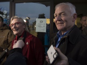 Minister of Crown-Indigenous Relation, Carolyn Bennett and B.C. Indigenous Relations Minister Scott Fraser smile as they leave talks at the Wet'suwet'en offices in Smithers on Feb. 27, 2020. The Ministers met with Wet'suwet'en hereditary chiefs to discuss the LNG pipeline.