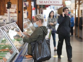 Shoppers at Granville island last week.