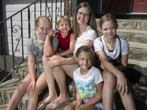 Ida Gazzola, who generally supports the school restart plan, with her children (clockwise from left) Bridget, 9, Anthony, 4, Catherine, 11, and Anne, 6, in North Vancouver.