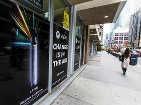 Vaping advertising on the windows of a convenience store at the corner of Wellington St. W. and Blue Jays Way in Toronto, Ont. on Friday October 25, 2019.