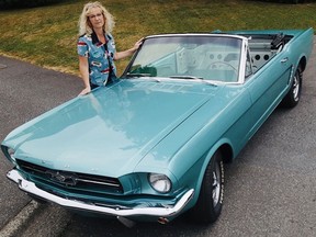 Abbotsford's Tammy Peters with her lovingly restored 1964.5 Mustang convertible that will have its coming out party at next weekend's Wings and Wheels car and aviation show at Tradex.