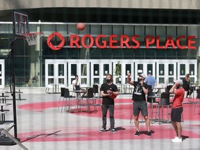 Players with the Vegas Golden Knights wear protective face masks as they play basketball in the recreation area outside Rogers Place on August 10, 2020 during the 2020 NHL Stanley Cup Playoffs in Edmonton.