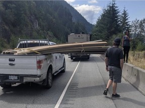 A Vancouver cyclist is in hospital recovering after being clotheslined from behind by an improperly secured load of lumber on a pickup truck.