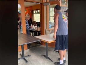 A video taken on Friday and posted to Facebook shows a man screaming at employees at the Chinese Garden Restaurant in Blind Bay, B.C.