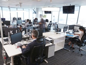 An office environment in normal (i.e., pre-COVID) times. Statistics Canada has reported that once the pandemic has subsided, almost one-quarter (22.5 per cent) of businesses expect employees working remotely could account for a tenth or more of their workforce.