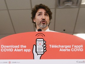 Prime Minister Justin Trudeau holds a press conference as he visits the Public Health Agency of Canada during the COVID-19 pandemic in Ottawa on July 31, 2020.