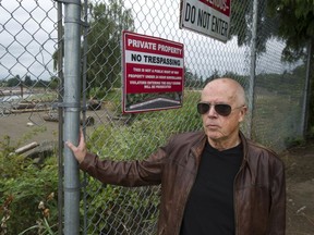 Barrie Philp says his great-grandfather, who gave the land that became Marine Drive Golf Club, would be appalled the club is blocking all citizens from a walking trail. (Photo: At fence where the Fraser River trail ends and the Marine Drive Golf Course begins.)