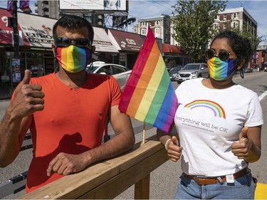 Sharv Ramachandran and Anusha Pippala of Davie Dosa Company show off a custom made dosa to celebrate gay pride in Vancouver, BC, August, 2, 2020.