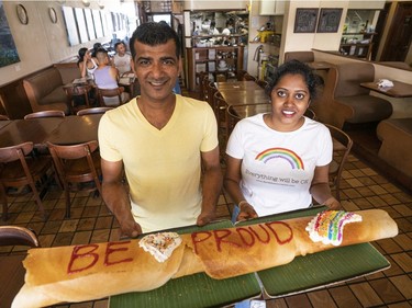 Sharv Ramachandran and Anusha Pippala of Davie Dosa Company show off a custom made dosa to celebrate gay pride in Vancouver, BC, August, 2, 2020.