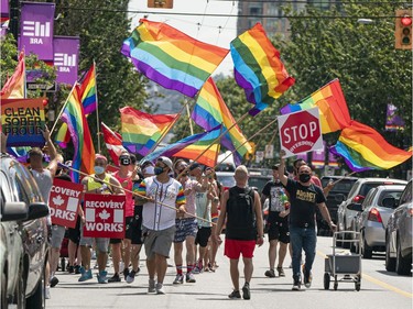 Members of Clean Sober Proud march along Davie Street to celebrate gay pride in Vancouver, BC, August, 2, 2020.