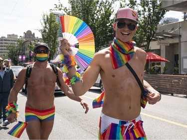 Members of Clean Sober Proud march along Davie Street to celebrate gay pride in Vancouver, BC, August, 2, 2020.