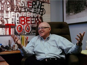 Byron Aceman in 2007 when he was interviewed for a story about the rarity of breast cancer in a man. He is shown in his office surrounded by some of the art he collected.