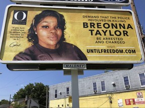 A billboard featuring a picture of Breonna Taylor and calling for the arrest of police officers involved in her death is seen on August 11, 2020 in Louisville, Kentucky.