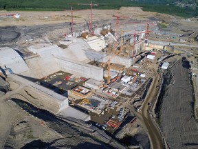 The spillway headworks, stilling basin, intakes, penstocks and powerhouse, shown under construction in June, at the Site C hydroelectric project near Fort St. John.