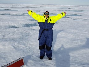 Researcher Mia Otokiak on sea ice in the middle of the Northwest Passage.