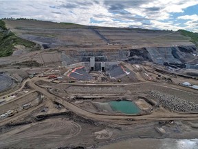 North bank overview in May of the completed diversion tunnel inlets, with channel, inlet cofferdam, portals and gate structures, at the Site C dam sight.