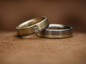 Golden wedding rings. Getty Images/iStockphoto [PNG Merlin Archive]