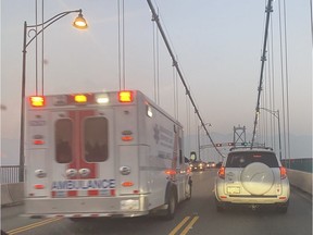 An accident in the northbound lane forced the closure of the Lions Gate Bridge Friday night. Marc van der Chijs took this photo while stopped on the bridge. He says there were two fire engines, two ambulances and five police cars at the scene.