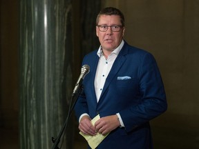 Saskatchewan Premier Scott Moe speaks to media following the federal government's Throne Speech during a news conference in the saskatchewan Legislative Building in Regina, Saskatchewan on Sept. 23, 2020.