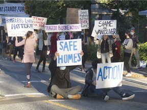 A number of protesters have taken to the Prior and Hawkes streets intersection near east Vancouver's Strathcona Park to pressure officials for action on the homeless camp that has been set up in the adjacent park.