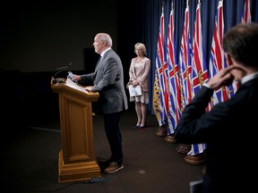 Premier John Horgan unveiled a health care plan to keep hospitals open, and surgeries scheduled, during a projected increase of COVID-19 cases during the fall and winter, on top of normal influenza cases.