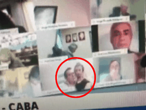 Argentine politician Juan Emilio Ameri appeared with a woman during a virtual meeting of the country's Congress.