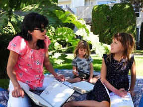 Diana Araya's daughter Isabel, right, who is in Grade 3, and her son, Rafael, who is in kindergarten, will learn at home this fall, rather than attend school in North Vancouver.