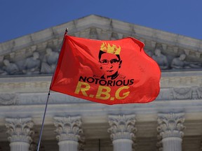 A flag flies in front of the U.S. Supreme Court in honour of the late Justice Ruth Bader Ginsburg on Sept. 21, 2020, in Washington, D.C. Ginsburg died of complications from pancreatic cancer on Sept. 18.