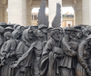 Detail from Timothy Schwarz’s bronze monument to migrants and asylum seekers, installed last year in St. Peter’s Square in Rome. (Handout)