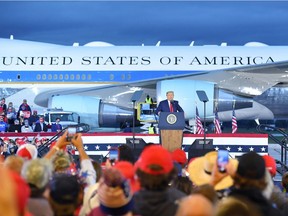 US President Donald Trump addresses supporters during a campaign rally at MBS International Airport in Freeland, Michigan on September 10, 2020.