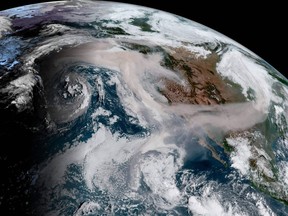 This Sept. 12, 2020, image obtained from the National Oceanic and Atmospheric Administration (NOAA) shows smoke from Oregon and California wildfires.