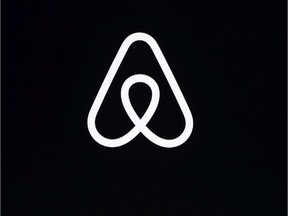 File photo shows an Airbnb logo during an event in San Francisco.