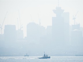 Smoke fills the sky and blankets the Vancouver skyline from wildfires burning in the northwestern United States.