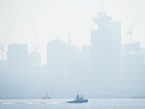 Smoke fills the sky and blankets the Vancouver skyline.