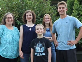 CHILLIWACK (UNDATED) -- A Chilliwack family -- (from left to right, back row) mom Angela Grace Greenwood, Hanna, 13, Maelyn, 17, Tyler, 19, and (front) Nathan, eight -- is participating the Hands Up Chilliwack program, which provides families with a meal kit that contains all the pre-measured ingredients for a meal, along with instructions and links to YouTube tutorials, as way of helping to improve literacy skills through comprehension. (Handout photo) [PNG Merlin Archive]