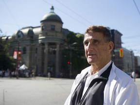 Dr. Sheldon Howard, in front of the Carnegie Community Centre in Vancouver's Downtown Eastside, will be honoured by Vancouver Coastal Health during a Monday awards ceremony for his 50 years of medical service.