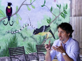 Prime Minister Justin Trudeau meets with local business owners to discuss the impacts of COVID-19 in a bistro in Montreal, on Monday, August 31, 2020.
