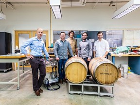 The BarrelWise team. The company's head of R&D — Miayan Yeremi, is third from left — won the outstanding entrepreneur of the year from Mitacs for his work on the sophisticated sensor at the centre of their innovation in wine making. Others on the team include, from the left, Artem Bocharov, director of sales; Jason Sparrow, CEO; Yeremi; Adrien Noble, mechanical designer; and David Sommer, chief technology officer.