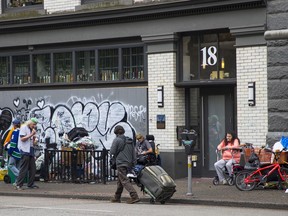 Residents of 18 West Hastings St. — a six-storey, rental, city-designated heritage building — say they’ve been prevented from entering their building and have been spit on by homeless people squatting at the front entrance to it.