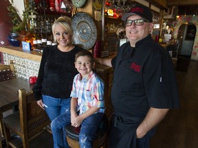 Jaclyn and Joel Villanueva with their son Cruz, 6, at their White Rock restaurant, Primos.