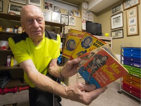 Len Damberger has an amazing collection of sports memorabilia, including walls of hockey photos, old calendars, old programs, books, posters and gold medals from competing in the Senior Games.