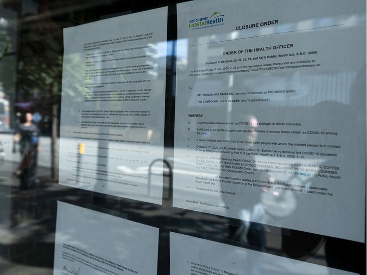  A Vancouver Coastal Health closure notice is posted on the window of The Compound/Heaven in Vancouver, BC, Sept. 6, 2020. There is a health alert for potential Covid-19 exposure on Aug. 29. 