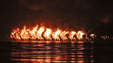 A huge fire destroyed the pier on New Westminster's waterfront. Firefighters from New Westminster, Coquitlam, Delta & Vancouver - including their Fireboats. No reports of injuries or a cause of the fire yet. Photos from the Surrey side of the Fraser River.