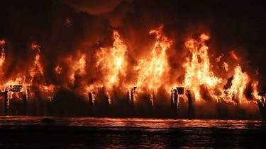 A huge fire destroyed the pier on New Westminster's waterfront. Firefighters from New Westminster, Coquitlam, Delta & Vancouver - including their Fireboats. No reports of injuries or a cause of the fire yet. Photos from the Surrey side of the Fraser River.